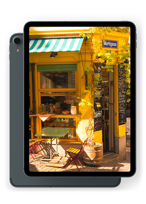 ipad with a photo of a coffee shop